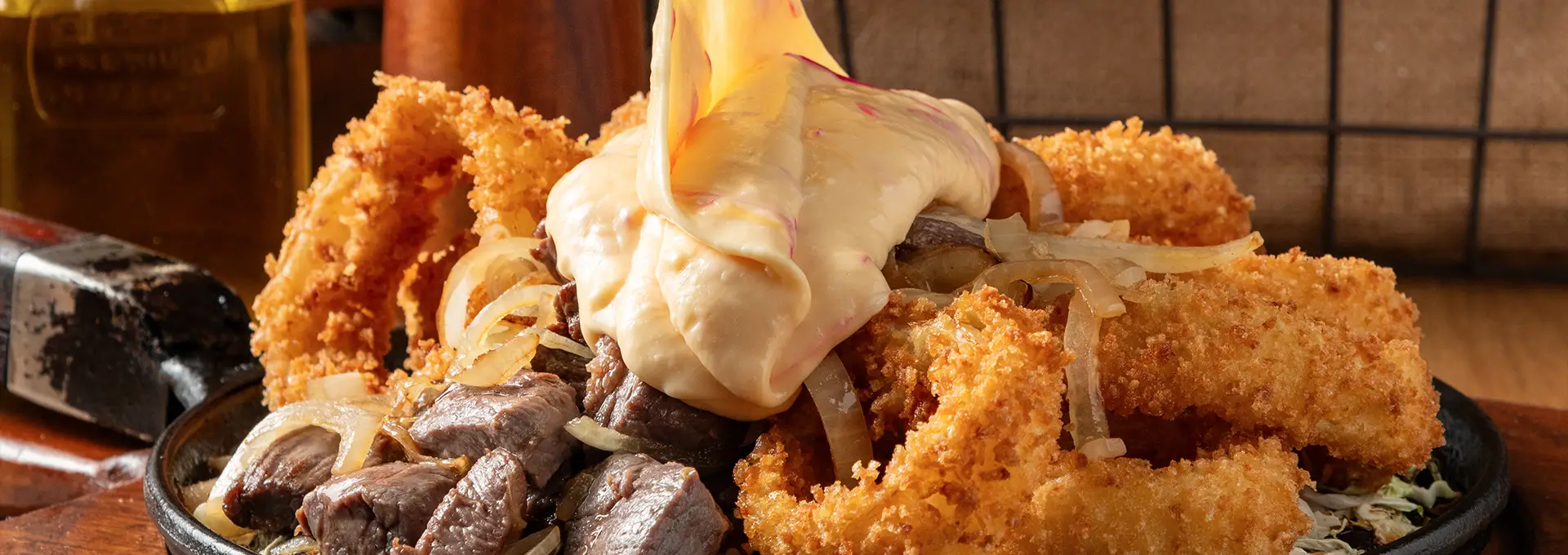 Carne com queijo coalho e fritura